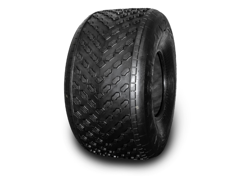 Шина низкого давления MARSHLAND BOLOTNIK 650/63-21 — 1350×650-533. Общий вид шины в сборе: посадка профиля и направленный рисунок протектора целиком. Характеристики: 2 слоя корда, вес 42 кг, индекс нагрузки 93 (650 кгс), символ скорости J (100 км/ч), рабочее давление 0,06–0,6 кг/см², от -60 до +55 °C, грунтозацеп 12 мм. Разработана под вездеходы ТРЭКОЛ, SeverTruck, ХАСКИ, Финист, Тундра 4×4, Тайга 2×4×4.